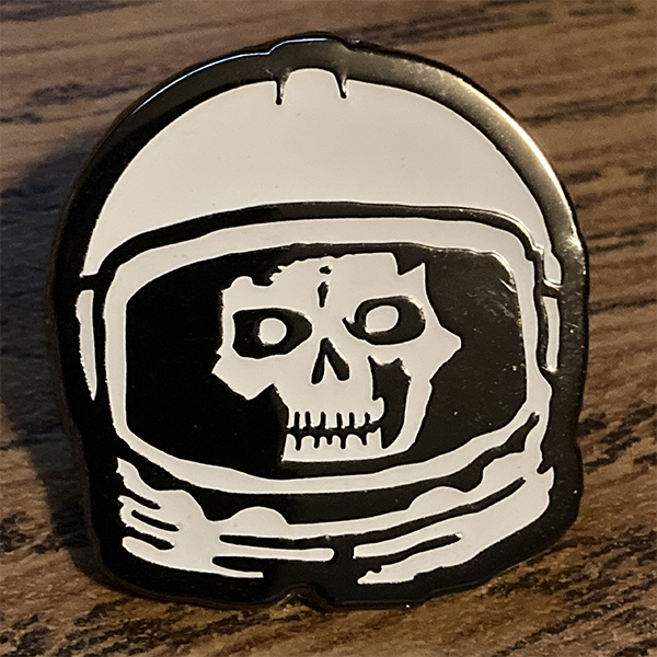 glow in the dark skullface astronaut enamel pin